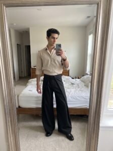 AWAISHU black wide-leg trousers, mirror selfie